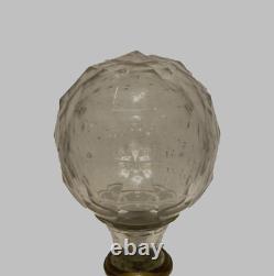 Boule d'escalier en cristal taillé et socle en laiton XX siècle