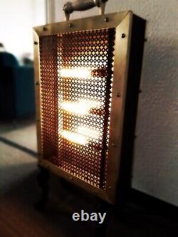 Lampe ancien radiateur pièce unique en laiton, céramique. Très rare
